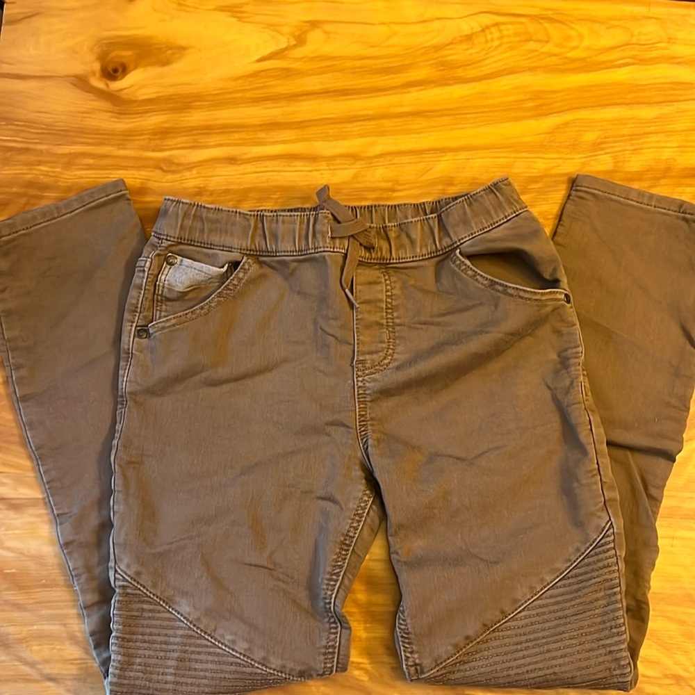 Brown drawstring khaki pants with cool details.